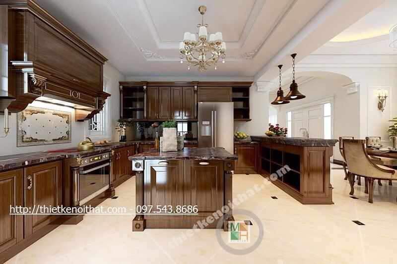 Thiết kế tủ bếp chữ u gỗ tự nhiên với tone màu trầm, mặt bếp ốp đá tự nhiên cao cấp thuận tiện cho việc vệ sinh và tạo sự thẩm mỹ cho căn bếp Tủ bếp biệt thự