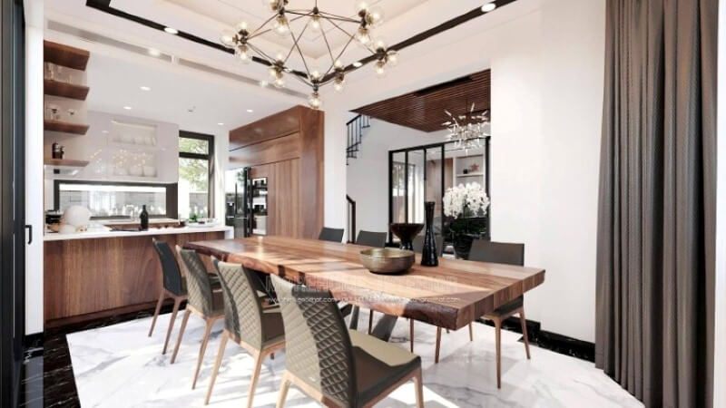 Ngoài điểm đặc biệt từ cách bố trí kệ trang trí, bàn đảo bằng đá granite màu trắng được thiết kế nhô ra ngoài lại là điểm đáng chú ý, một mặt vẫn đảm bảo diện tích để chủ nhân có thể trưng bày món ăn thỏa mái, một mặt bạn lại có thể vừa nội trợ vừa có thể để mắt con học một cách dễ dàng.